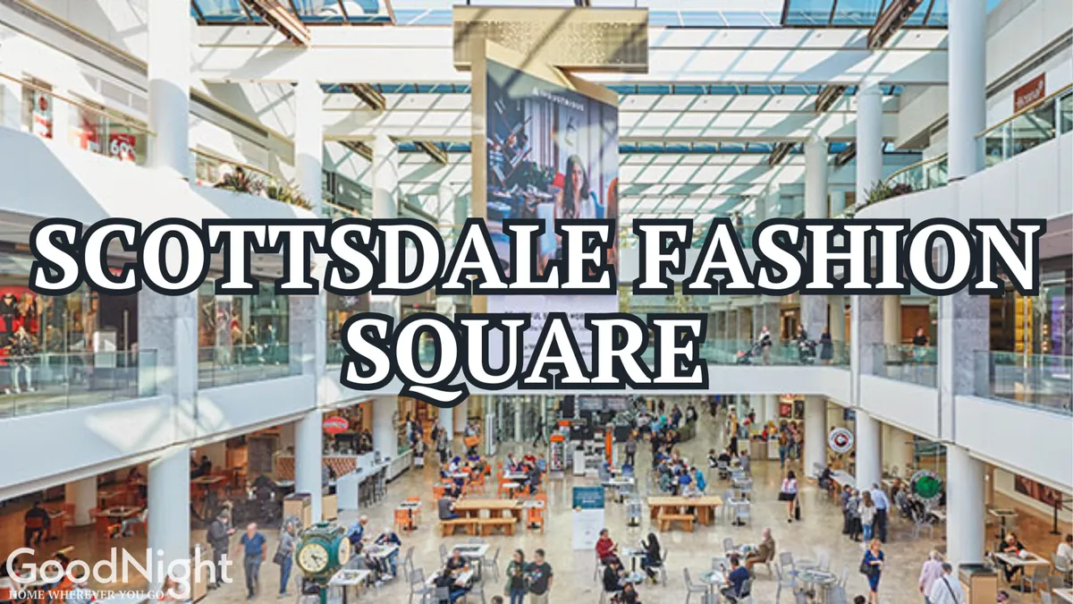 This lively interior shot showcases a bustling shopping and dining environment, complete with a large digital screen overhead, central seating area, and upscale boutiques. The energetic atmosphere reflects the vibrant local experiences available nearby.